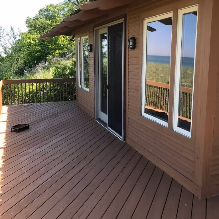 Pressure Washing Three Oaks & Sawyer MI - restored deck with a lake view